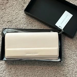 Charles & Keith pale pink wallet with magnetic snap closure
